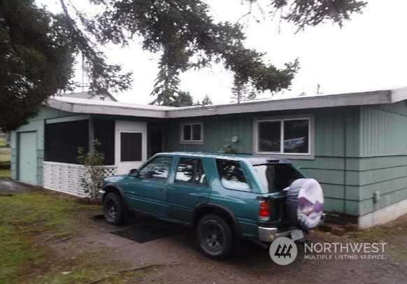 1005 Sheridan Road Bremerton, WA 98310 - Photo 1 of 1 a front view of a house with parking space