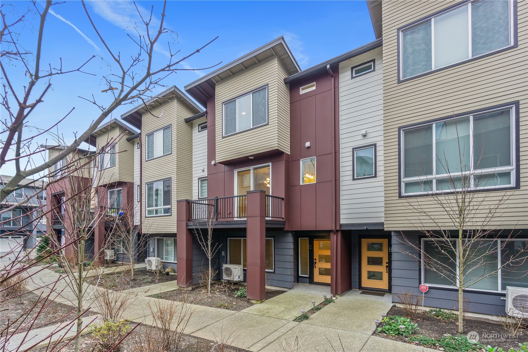 23802 7th Avenue Southeast, Unit C Bothell, WA 98021 - Photo 1 of 28 a front view of a house with garden