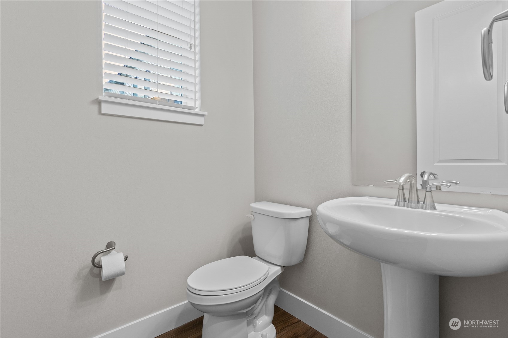 23802 7th Avenue Southeast, Unit C Bothell, WA 98021 - Photo 20 of 28 a bathroom with a toilet sink and mirror