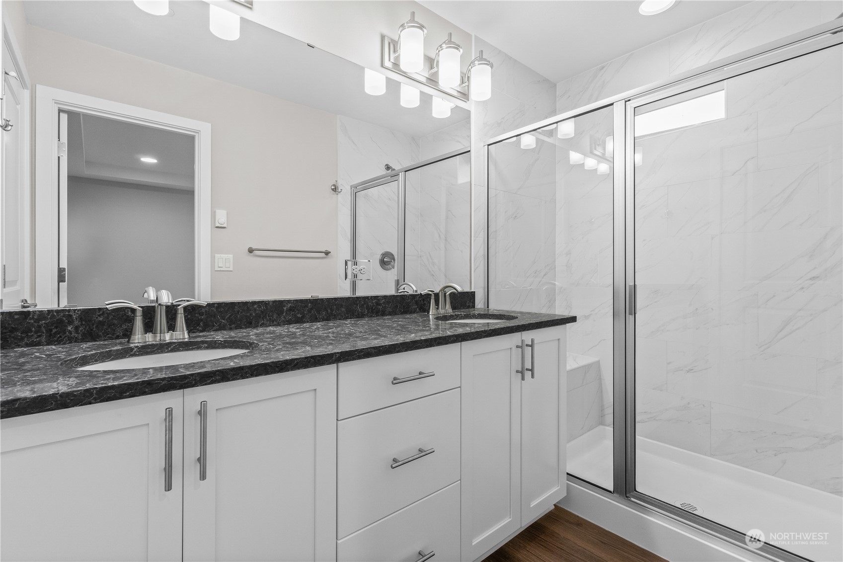 23802 7th Avenue Southeast, Unit C Bothell, WA 98021 - Photo 23 of 28 a bathroom with a granite countertop sink and a mirror