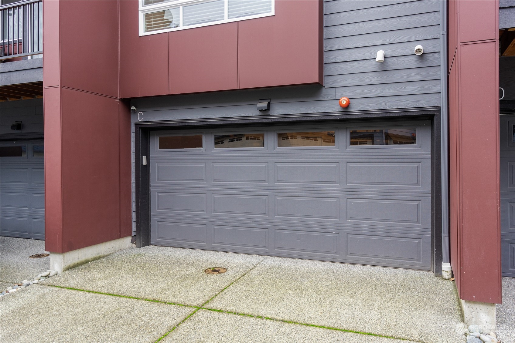 23802 7th Avenue Southeast, Unit C Bothell, WA 98021 - Photo 26 of 28 a view of a house with a garage