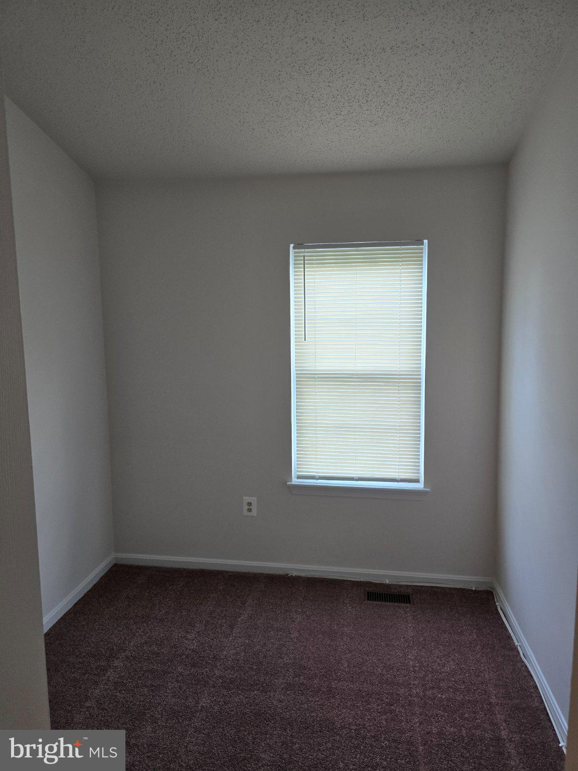 809 St Michaels Drive Bowie, MD 20721 - Photo 13 of 17 an empty room with a window