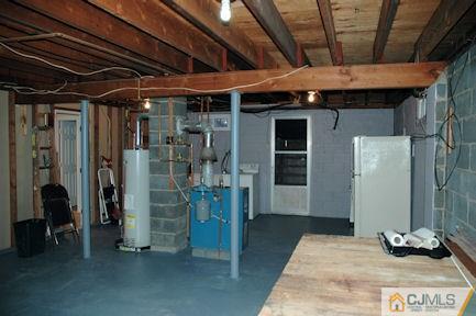 10 Maple Road Iselin, NJ 08830 - Photo 12 of 15 a view of a room with wooden floor