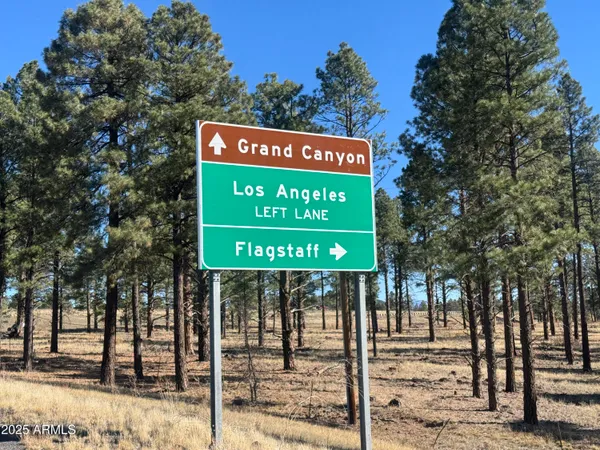 a sign on the side of a road