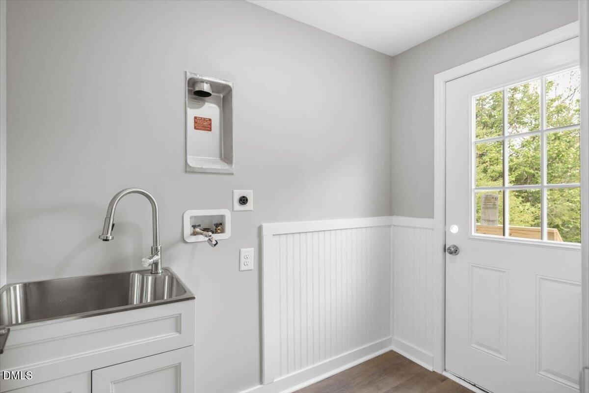 509 Sparella Street Durham, NC 27703 - Photo 27 of 30 a close view of a sink and dishwasher in front of a window