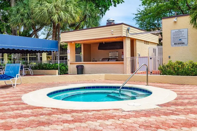 a view of a house with a swimming pool