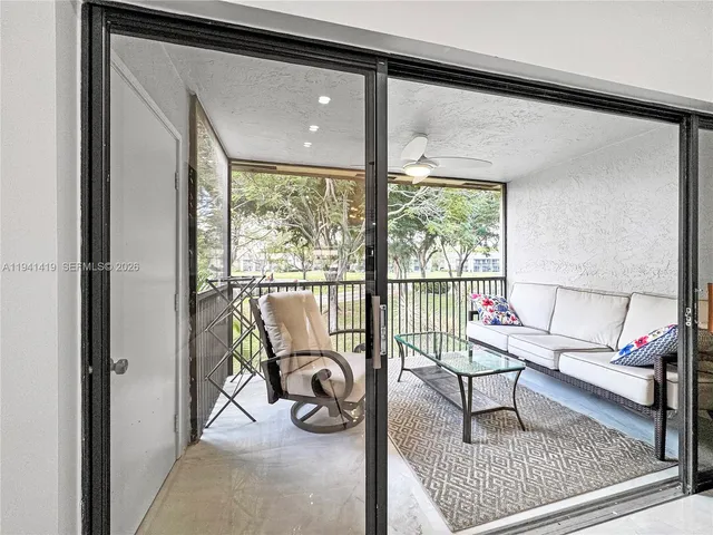 a living room with a couch and a table