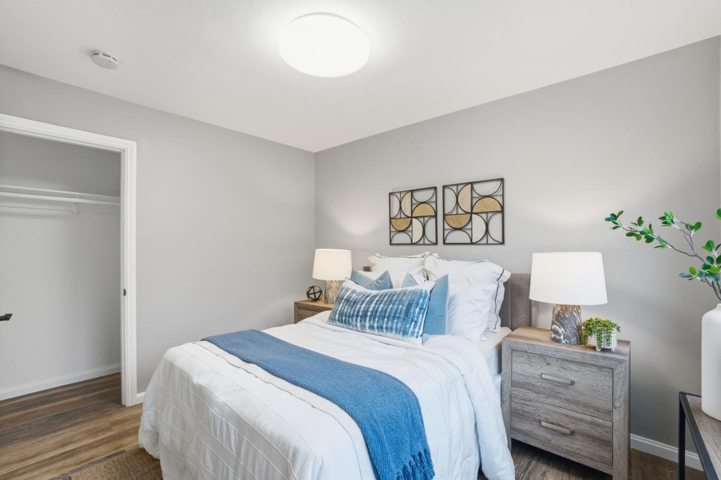 200 Anita Road Burlingame, CA 94010 - Photo 21 of 50 a bedroom with a bed and painting on the wall