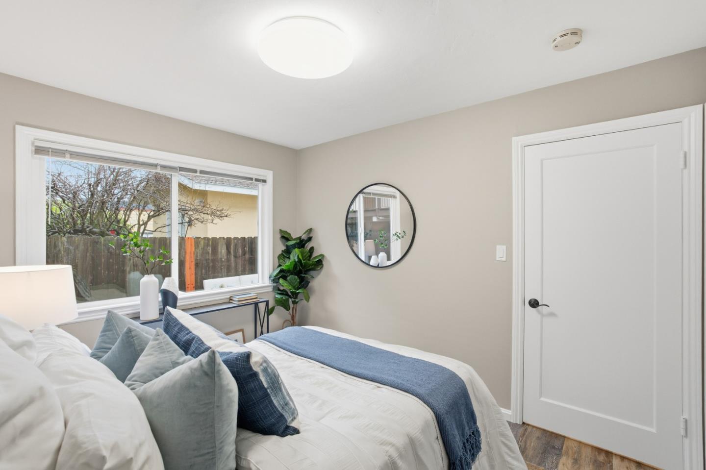 200 Anita Road Burlingame, CA 94010 - Photo 22 of 50 a bedroom with bed and a large window