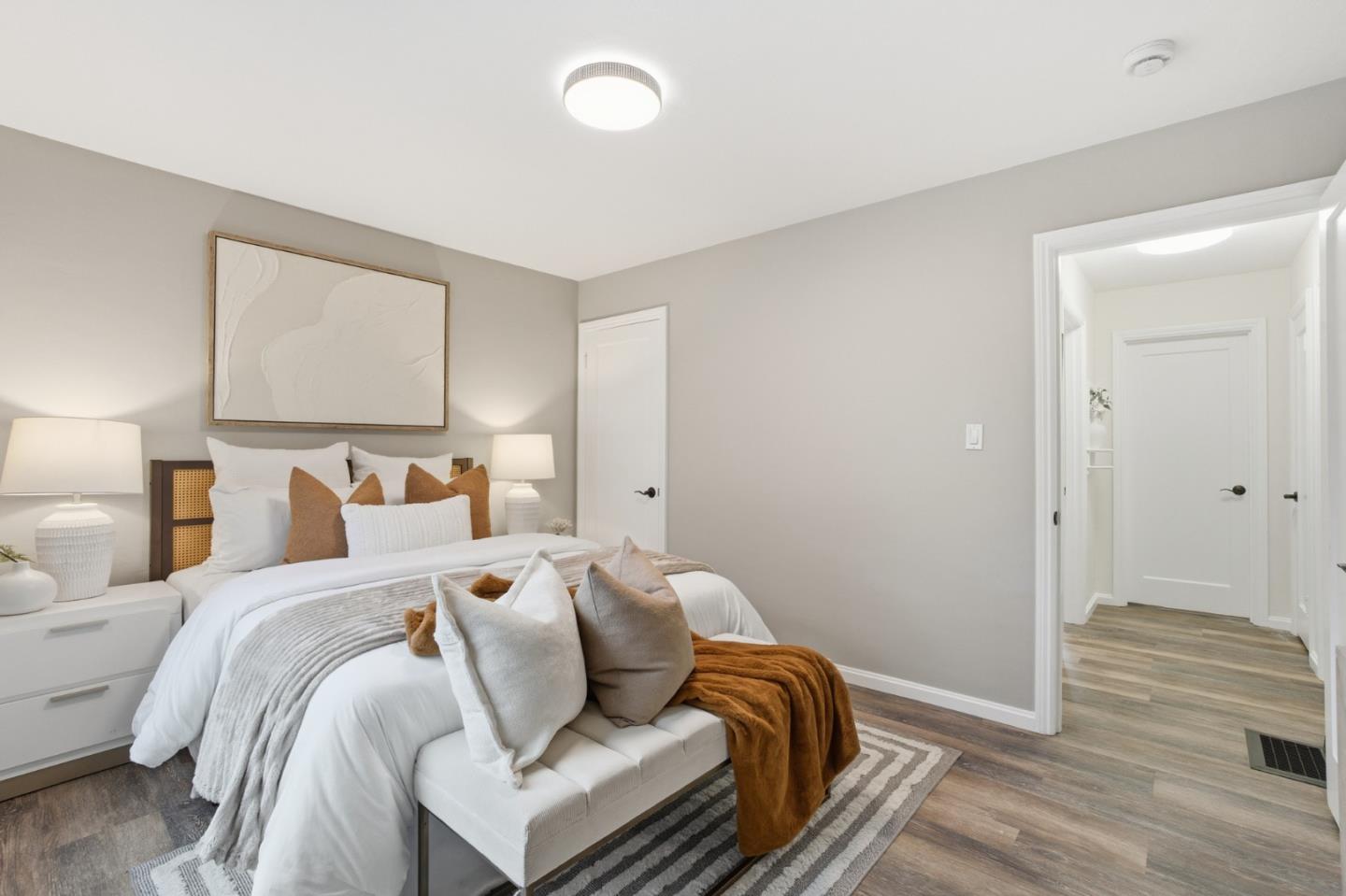 200 Anita Road Burlingame, CA 94010 - Photo 24 of 50 a bed room with a bed and a painting