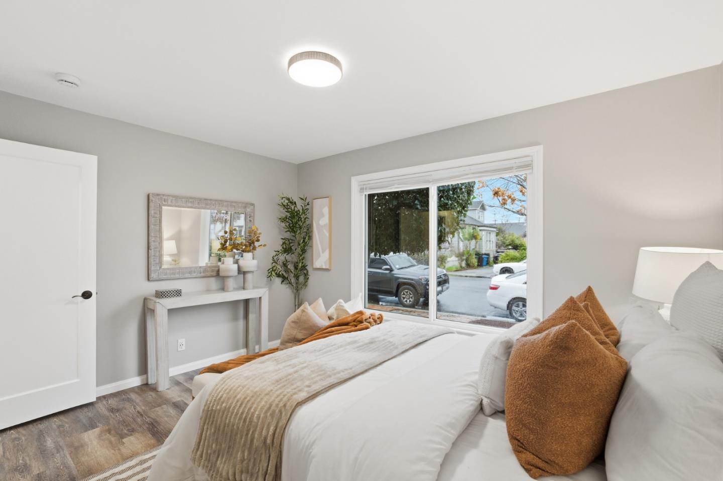 200 Anita Road Burlingame, CA 94010 - Photo 25 of 50 a bedroom with a bed and a large window