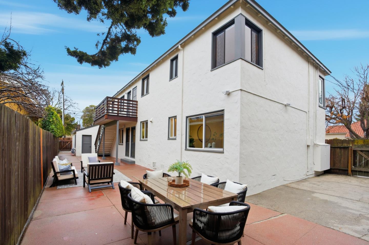 200 Anita Road Burlingame, CA 94010 - Photo 30 of 50 a backyard of a house with table and chairs