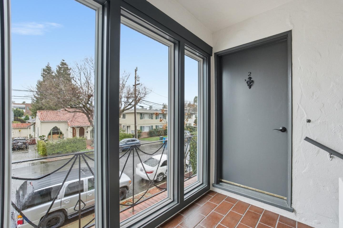 200 Anita Road Burlingame, CA 94010 - Photo 33 of 50 a view of a room with a large window and wooden floor