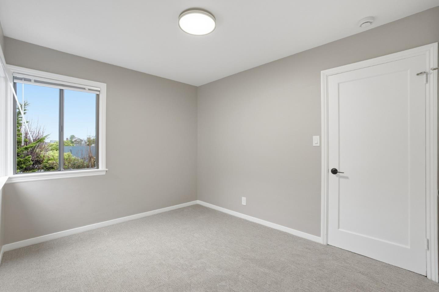 200 Anita Road Burlingame, CA 94010 - Photo 41 of 50 an empty room with a window