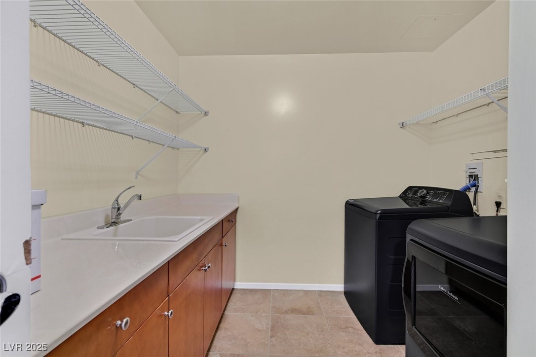 8255 South Las Vegas Boulevard, Unit 1812 Las Vegas, NV 89123 - Photo 14 of 43 Separate laundry room w/sink and storage