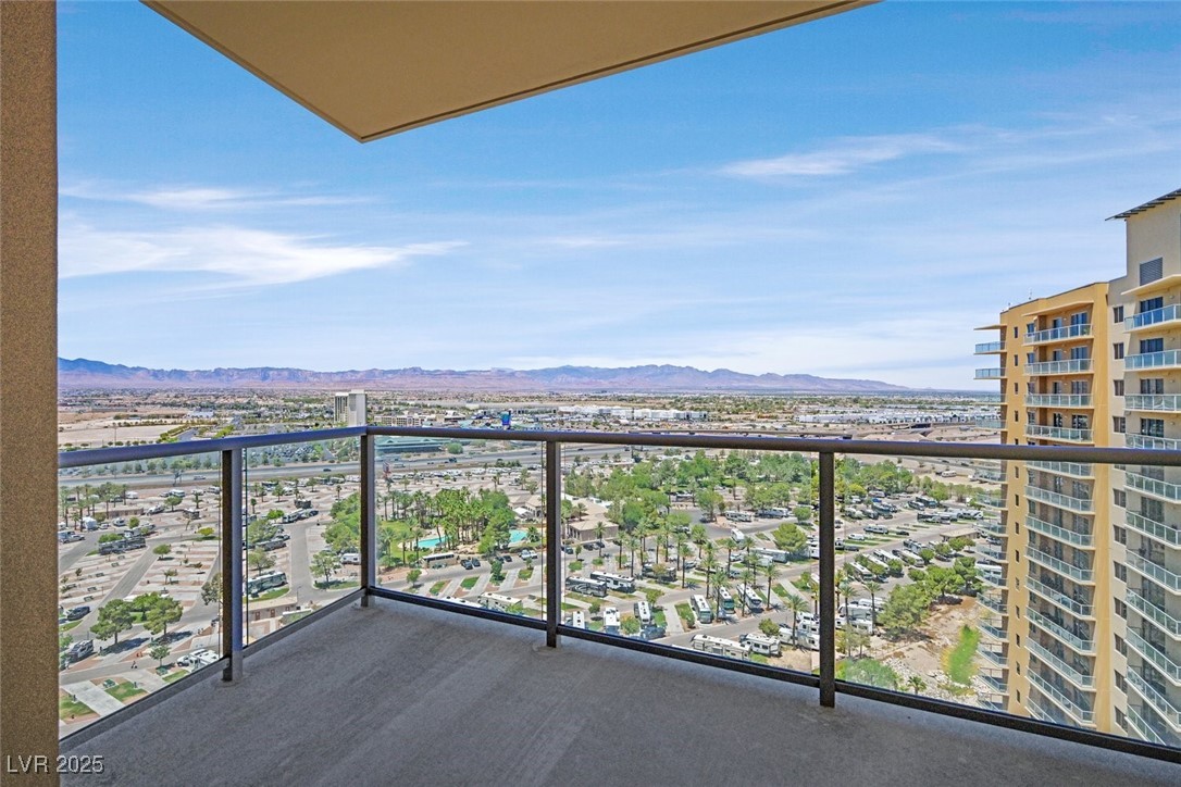 8255 South Las Vegas Boulevard, Unit 1812 Las Vegas, NV 89123 - Photo 25 of 43 Balcony featuring a city view and a mountain view