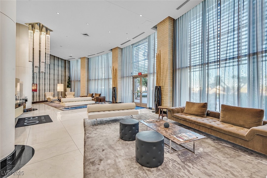 8255 South Las Vegas Boulevard, Unit 1812 Las Vegas, NV 89123 - Photo 42 of 43 Lobby with floor to ceiling windows.