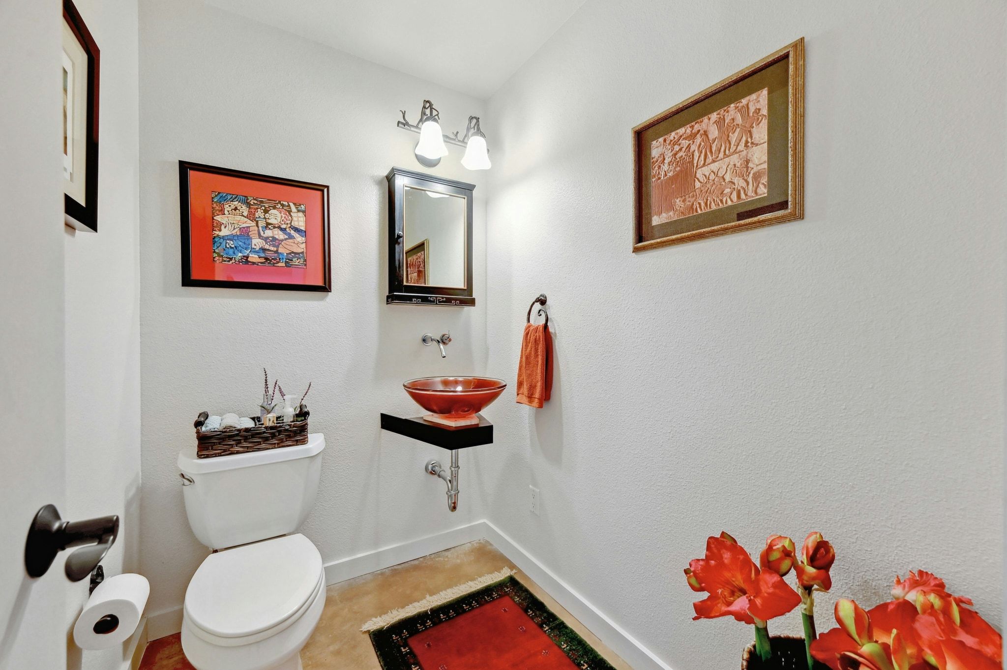 2147 Tejas Trail Blanco, TX 78606 - Photo 17 of 29 a bathroom with a toilet a sink and a mirror