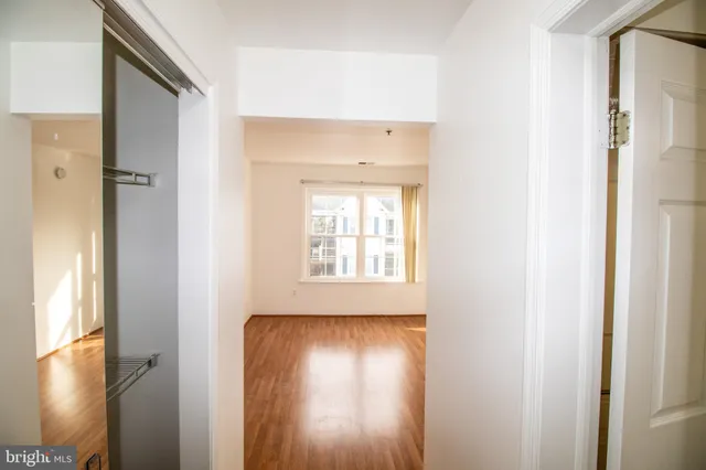 a view of front door with wooden floor