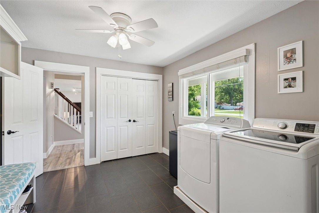 8191 Edgewood Road Mentor, OH 44060 - Photo 23 of 44 Well-designed mudroom featuring tons of storage, laundry area with washer and dryer, and easy access from the garage for a functional drop zone