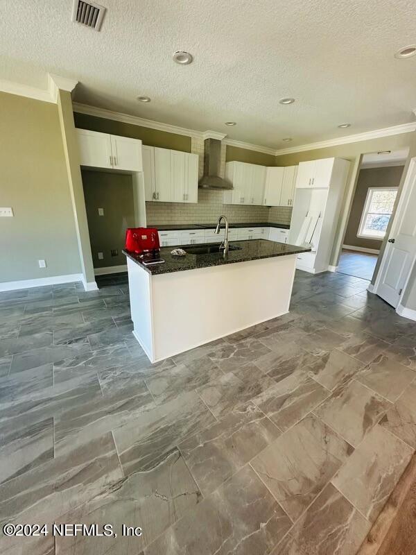 868 Jones Road Jacksonville, FL 32220 - Photo 7 of 19 a kitchen with stainless steel appliances wooden cabinets and granite counter tops