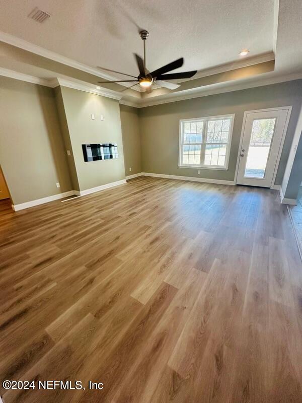 868 Jones Road Jacksonville, FL 32220 - Photo 8 of 19 a view of livingroom with hardwood floor and front door