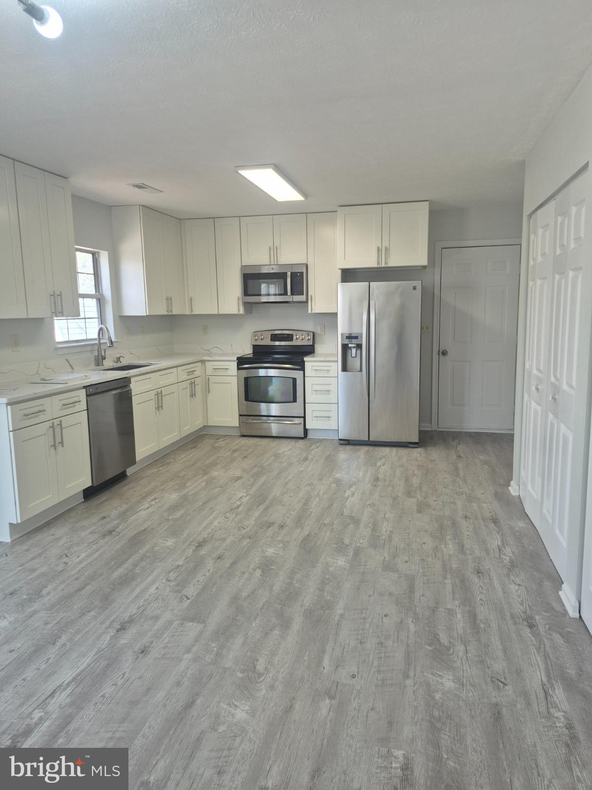2855 Stavors Road Waldorf, MD 20603 - Photo 15 of 34 a large kitchen with cabinets and stainless steel appliances