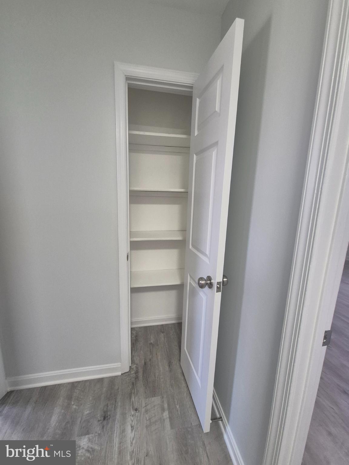 2855 Stavors Road Waldorf, MD 20603 - Photo 34 of 34 a view of closet area with wooden floor