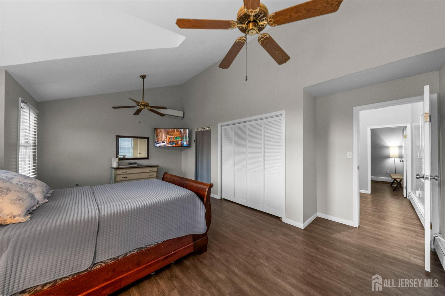 436 Hunt Avenue Hamilton, NJ 08610 - Photo 18 of 40 a bedroom with a bed and wooden floor
