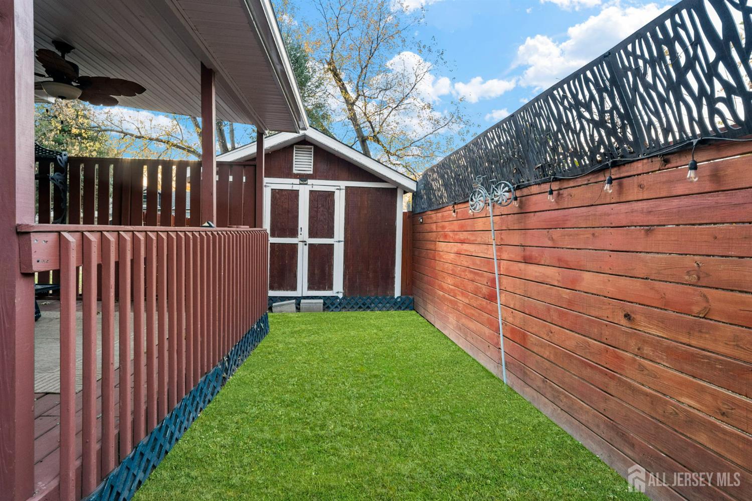 436 Hunt Avenue Hamilton, NJ 08610 - Photo 34 of 40 a view of a backyard with wooden fence