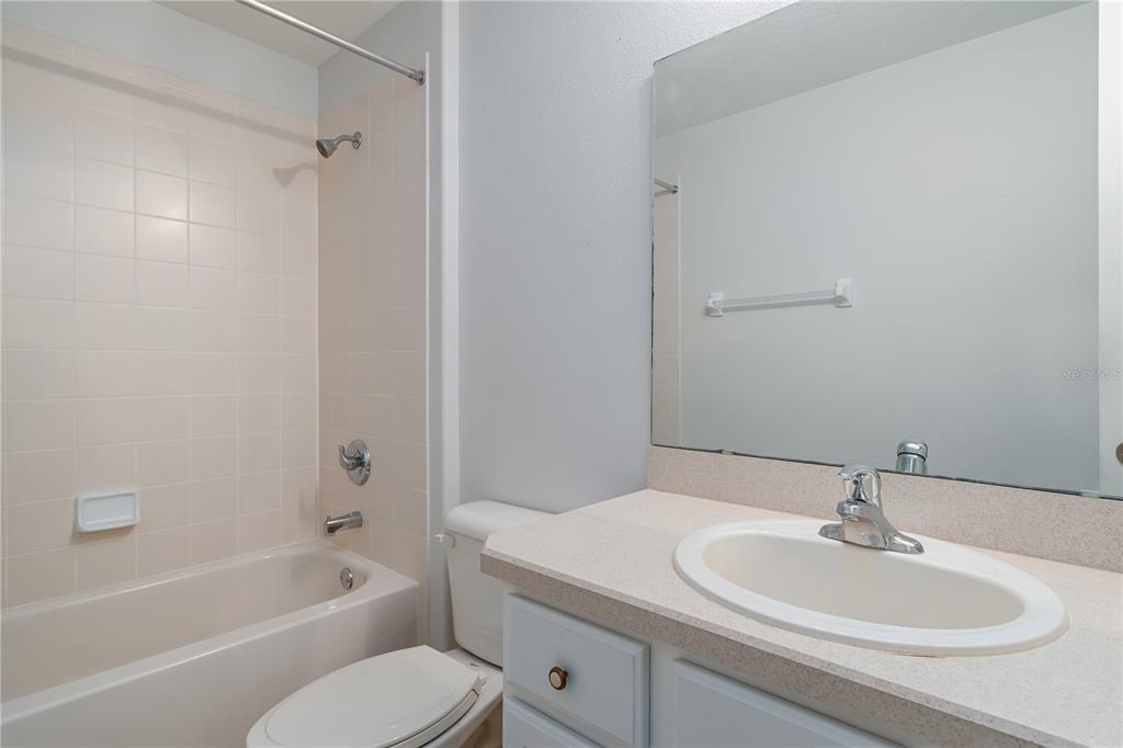 15692 Southwest 11th Court Road Ocala, FL 34473 - Photo 19 of 49 a bathroom with a sink toilet and a bathtub