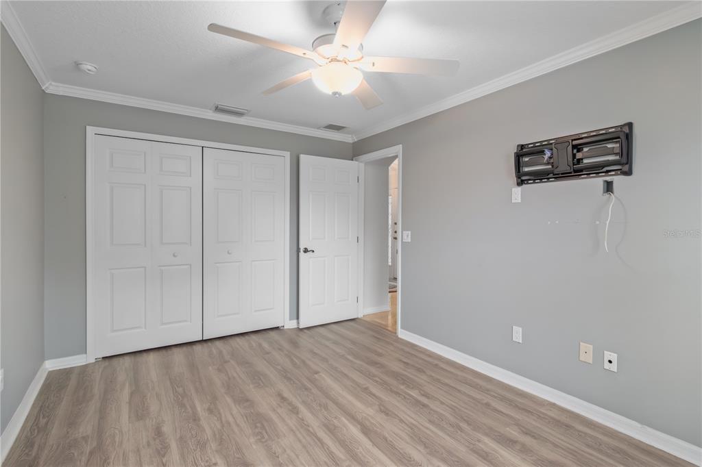 15692 Southwest 11th Court Road Ocala, FL 34473 - Photo 21 of 49 wooden floor in an empty room