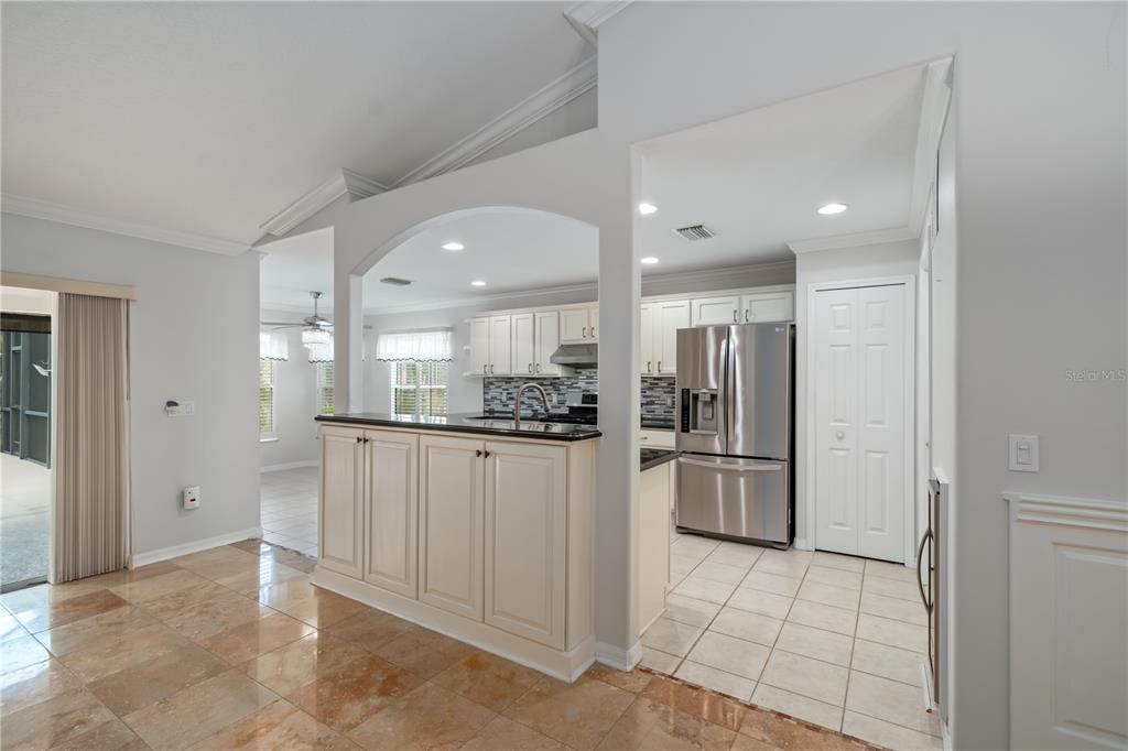 15692 Southwest 11th Court Road Ocala, FL 34473 - Photo 23 of 49 a bathroom with a sink and stainless steel appliances