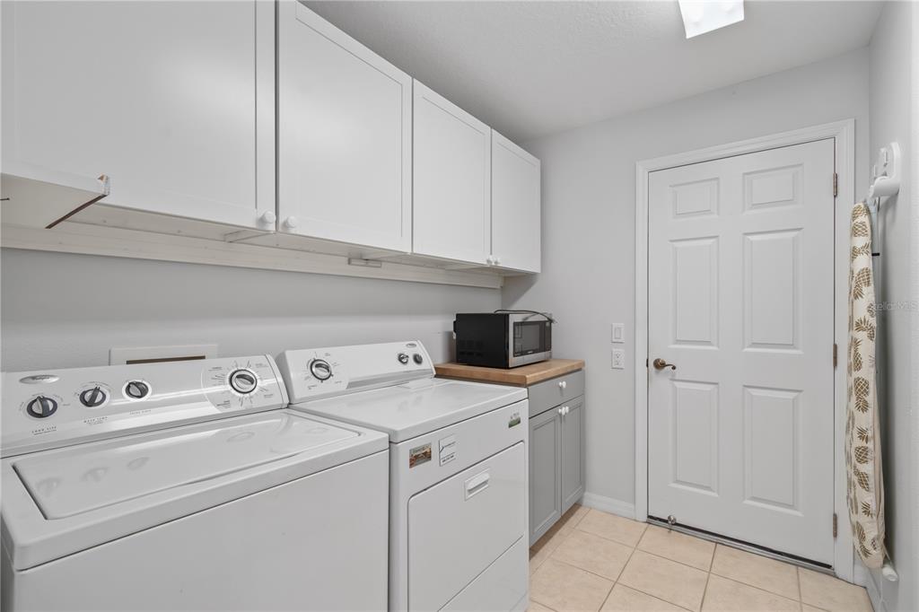 15692 Southwest 11th Court Road Ocala, FL 34473 - Photo 30 of 49 a utility room with dryer and washer