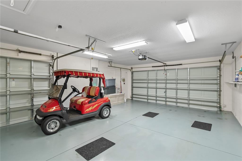 15692 Southwest 11th Court Road Ocala, FL 34473 - Photo 38 of 49 a car parked in a garage