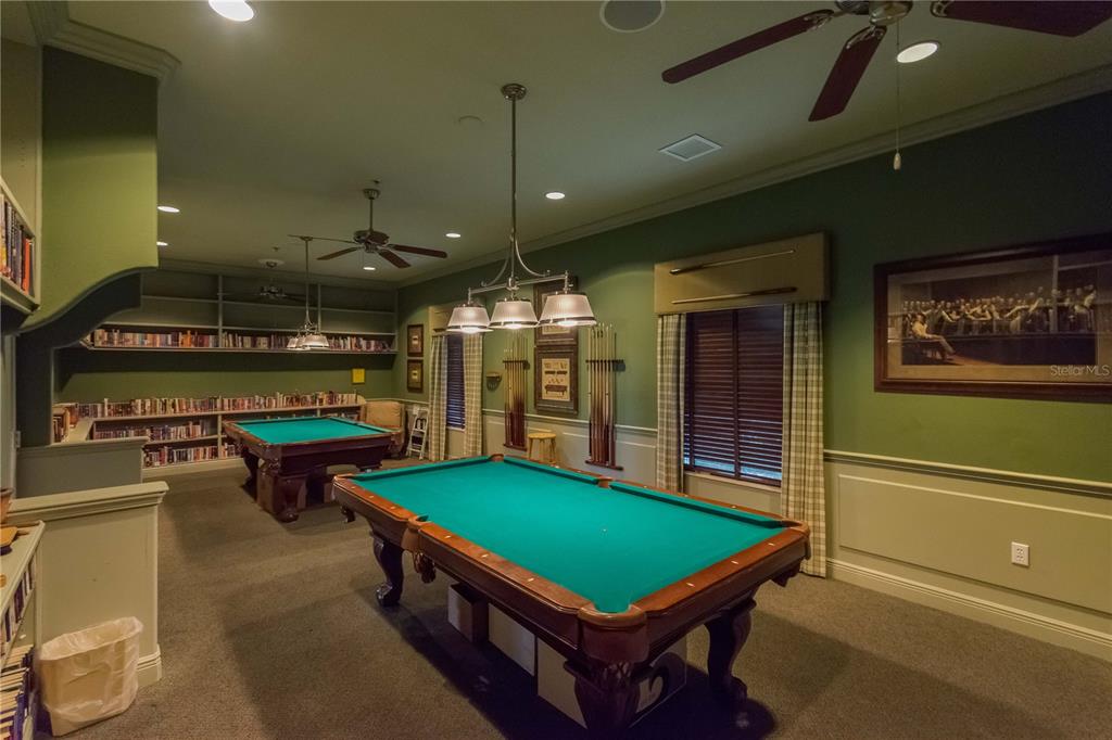 15692 Southwest 11th Court Road Ocala, FL 34473 - Photo 45 of 49 a room with pool table table tennis pool table and a chandelier