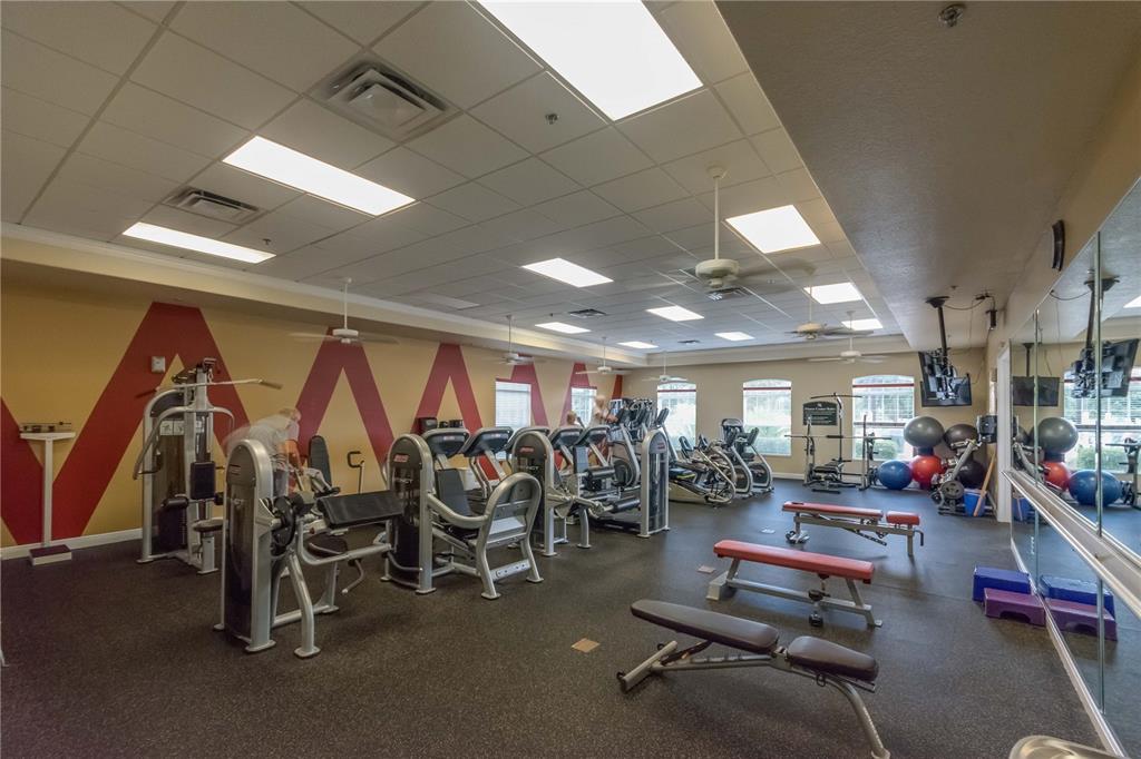 15692 Southwest 11th Court Road Ocala, FL 34473 - Photo 46 of 49 a view of a room with gym equipment