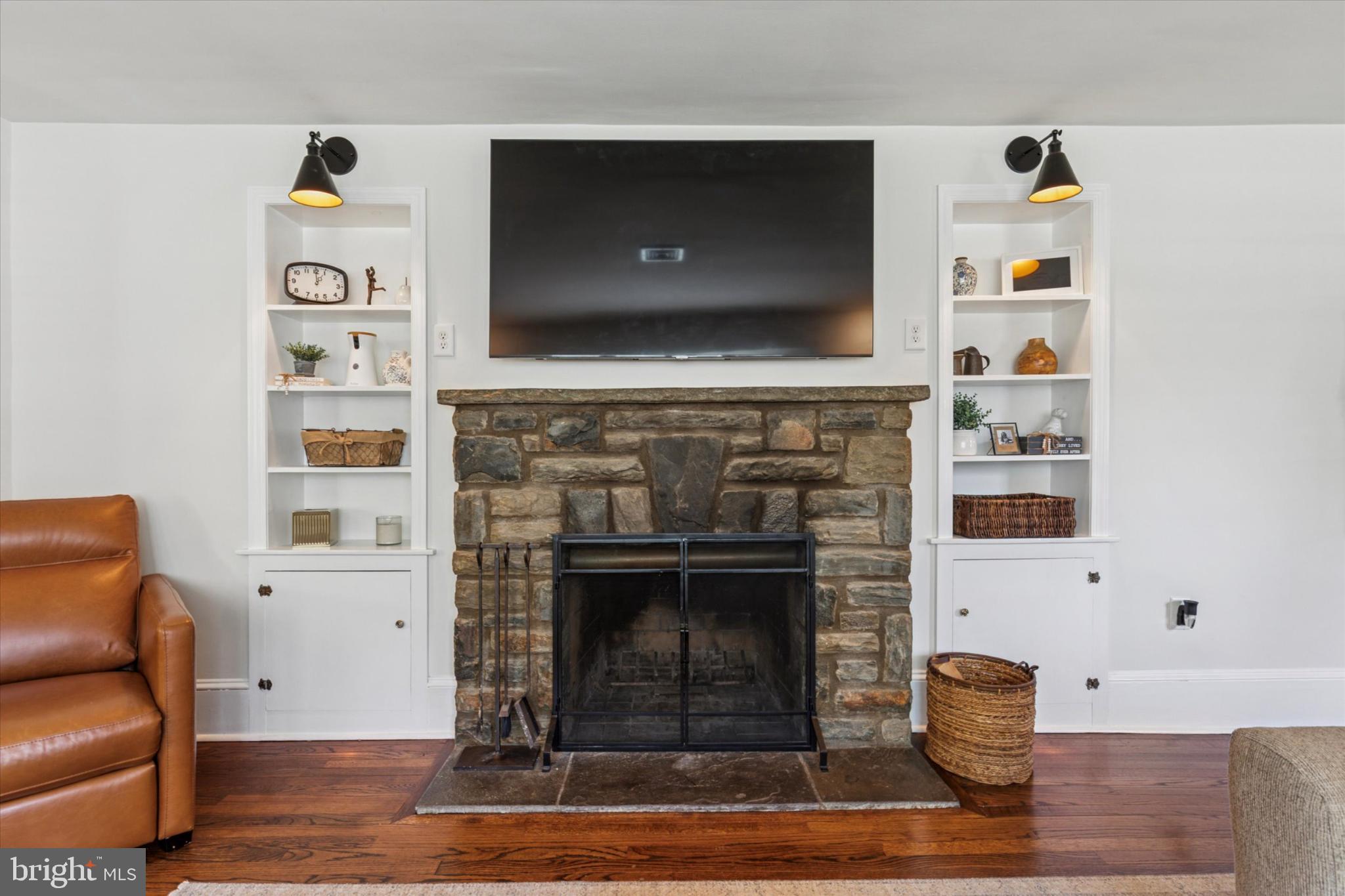 3029 Arch Road Norristown, PA 19401 - Photo 4 of 27 a living room with furniture and a fireplace
