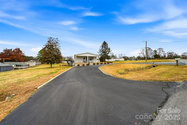 a view of a swimming pool with an ocean view