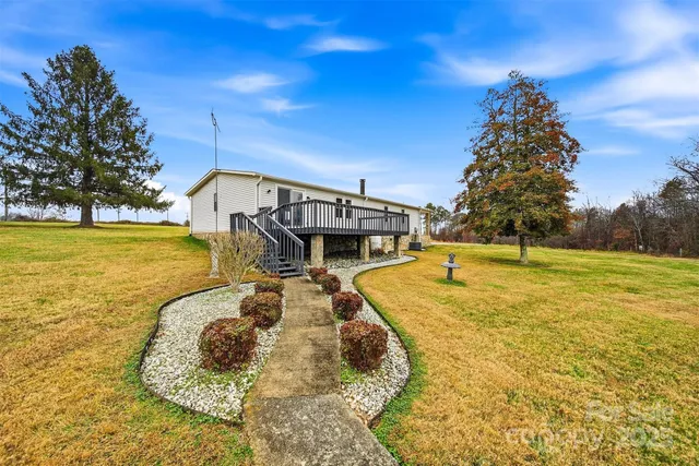 a swimming pool with wooden fence