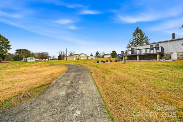 a view of a swimming pool with an ocean view