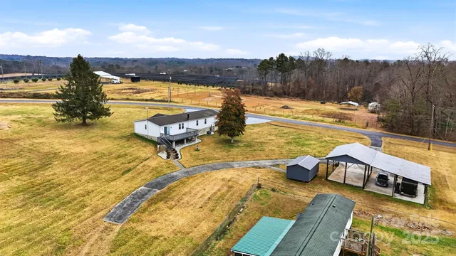 a view of a swimming pool with a lounge chairs
