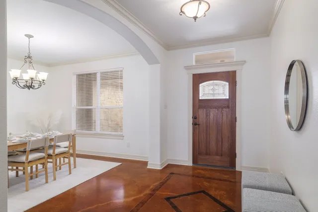 a view of a livingroom with furniture and window