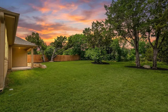 a view of a backyard with a garden