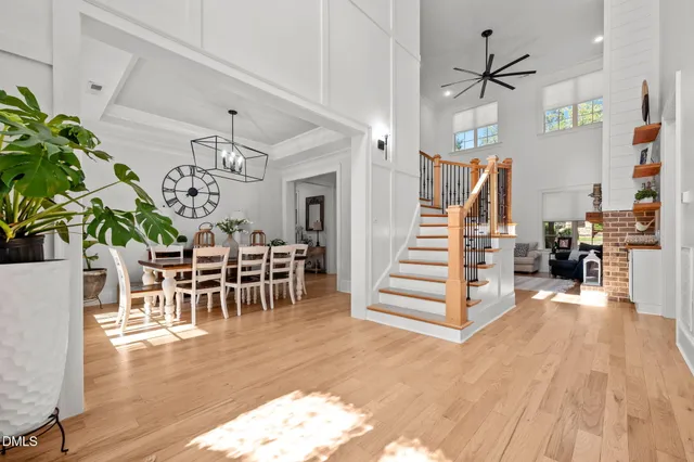a view of a livingroom with furniture and stairs