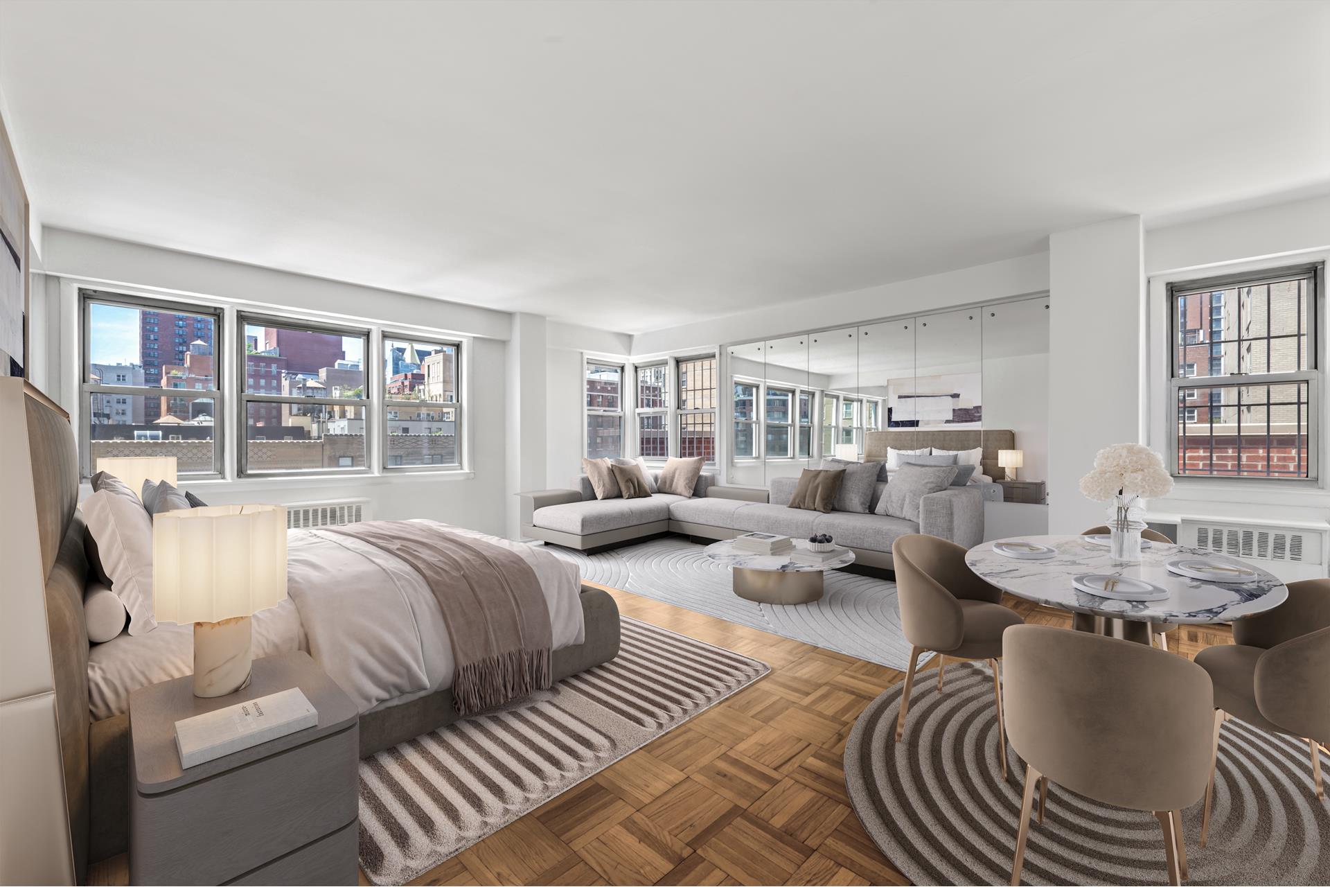 150 East 37th Street, Unit 12C Manhattan, NY 10016 - Photo 1 of 6 a living room with furniture and a table