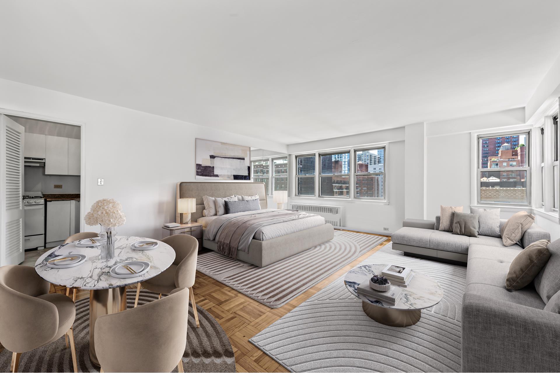 150 East 37th Street, Unit 12C Manhattan, NY 10016 - Photo 2 of 6 a living room with furniture and a wooden floor