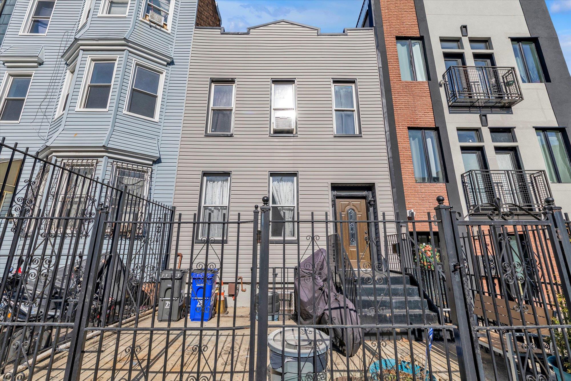 79 Eldert Street Brooklyn, NY 11207 - Photo 1 of 1 Multi unit property featuring fence
