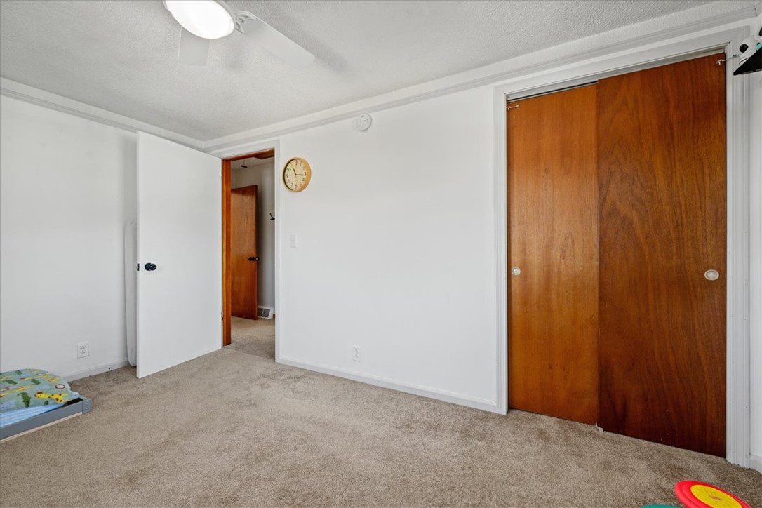 6 Fuller Street Pelzer, SC 29669 - Photo 19 of 36 This spacious room offers comfort and versatility, perfect for rest or activity.