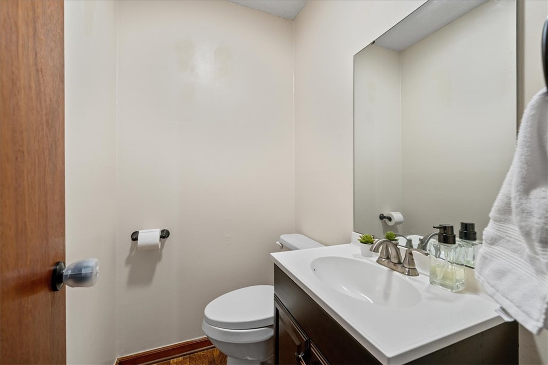 6 Fuller Street Pelzer, SC 29669 - Photo 21 of 36 This clean and inviting powder room offers a practical and refreshing space.